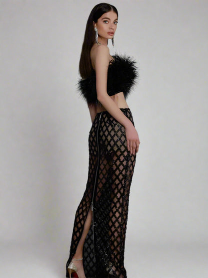Back side of sequined skirt feathered top